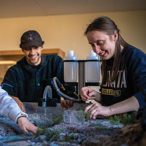 photo of students using river table