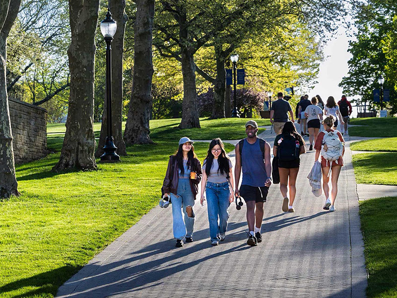 students walk in front of Kepple Hall