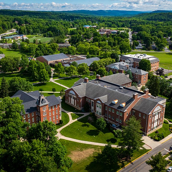 the class 0f 1975 celebrate while presenting the 50th reunion gift